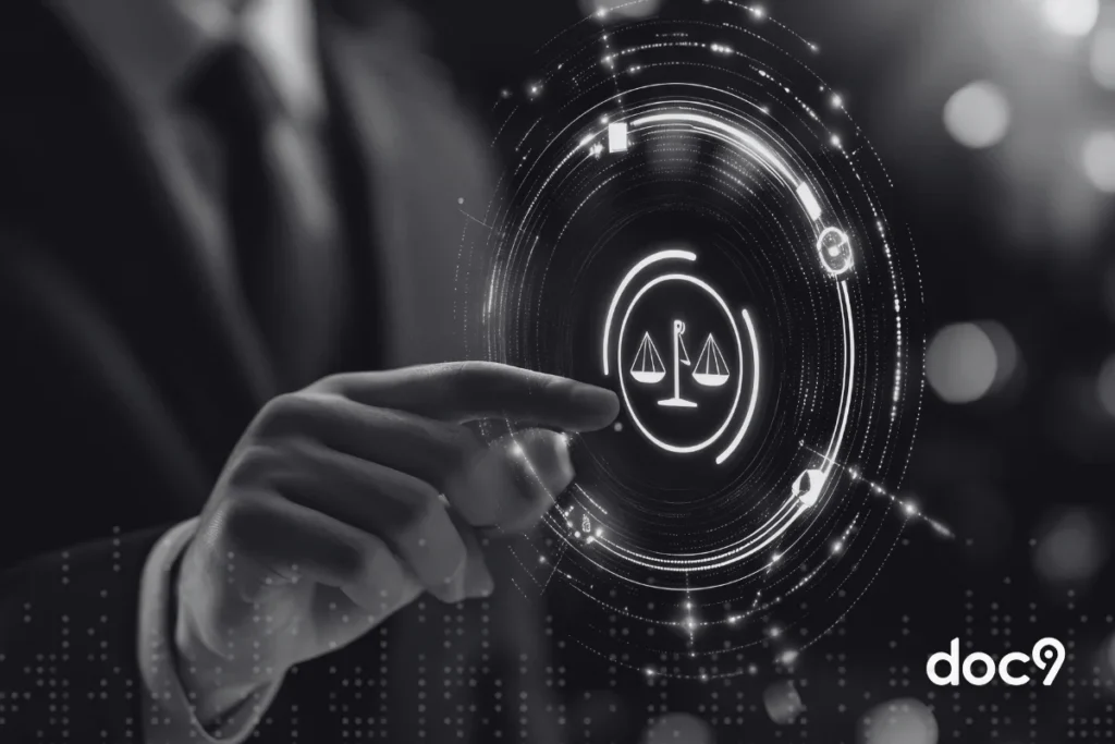 Mão masculina aponta para o símbolo do direito, representando a advocacia 4.0 do artigo da doc9.